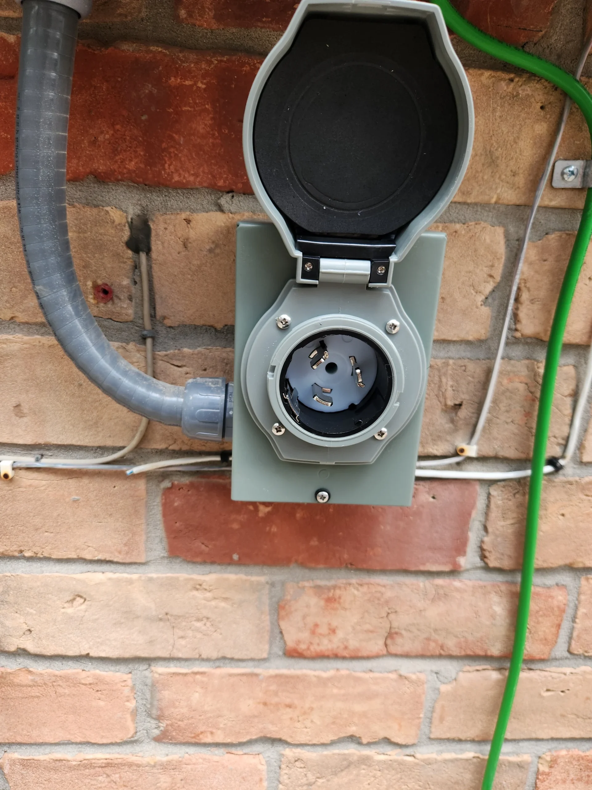 portable generator plug installation for a house by an expert electrician in Spring, TX.